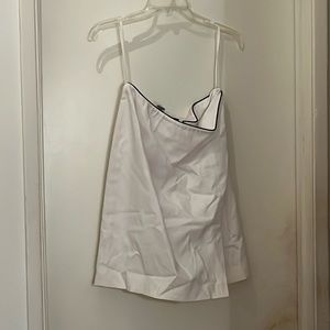 White suit with black piping